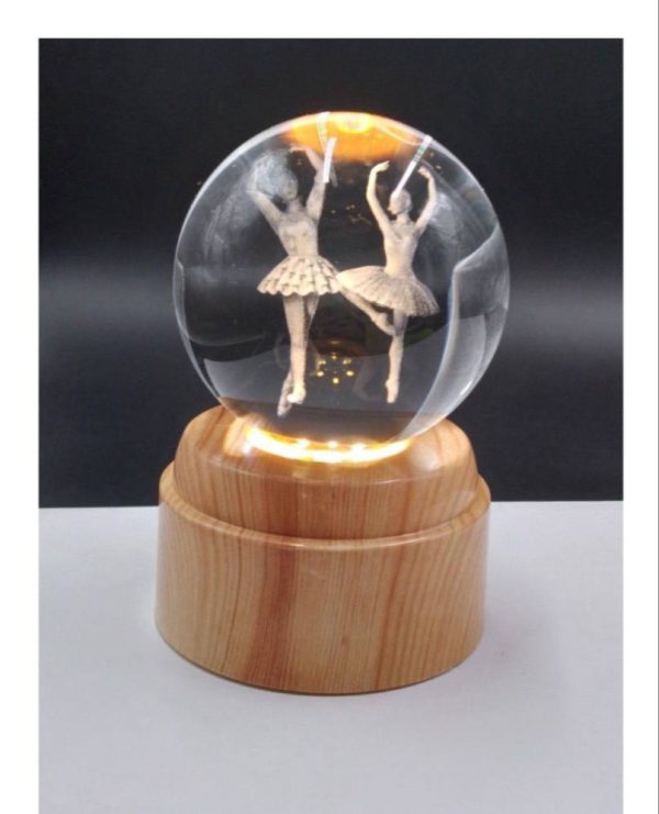 photo_10_2025-05-11_21-08-54 گوی لیزری چرخشی پایه طرح چوب دختران بالرین روی پا - Image 1