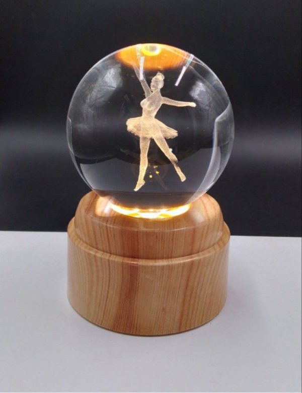 photo_7_2025-05-11_21-08-54 گوی لیزری چرخشی پایه طرح چوب دختربالرین - Image 1