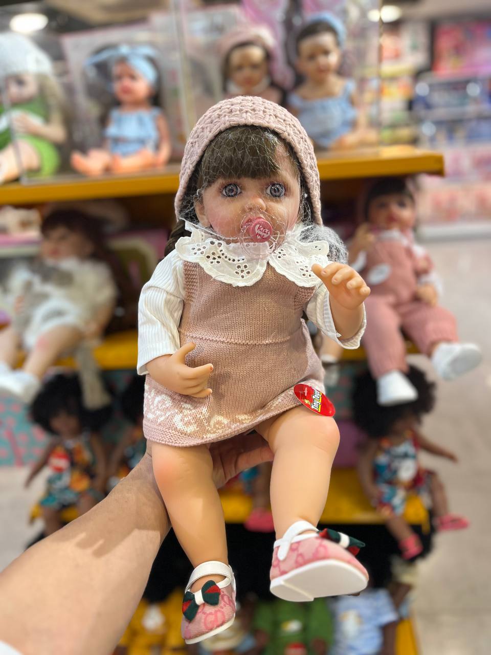 photo_2025-09-17_20-15-09 عروسک سیلیکونی اورجینال 55 سانت کلاه دار - تصویر 1