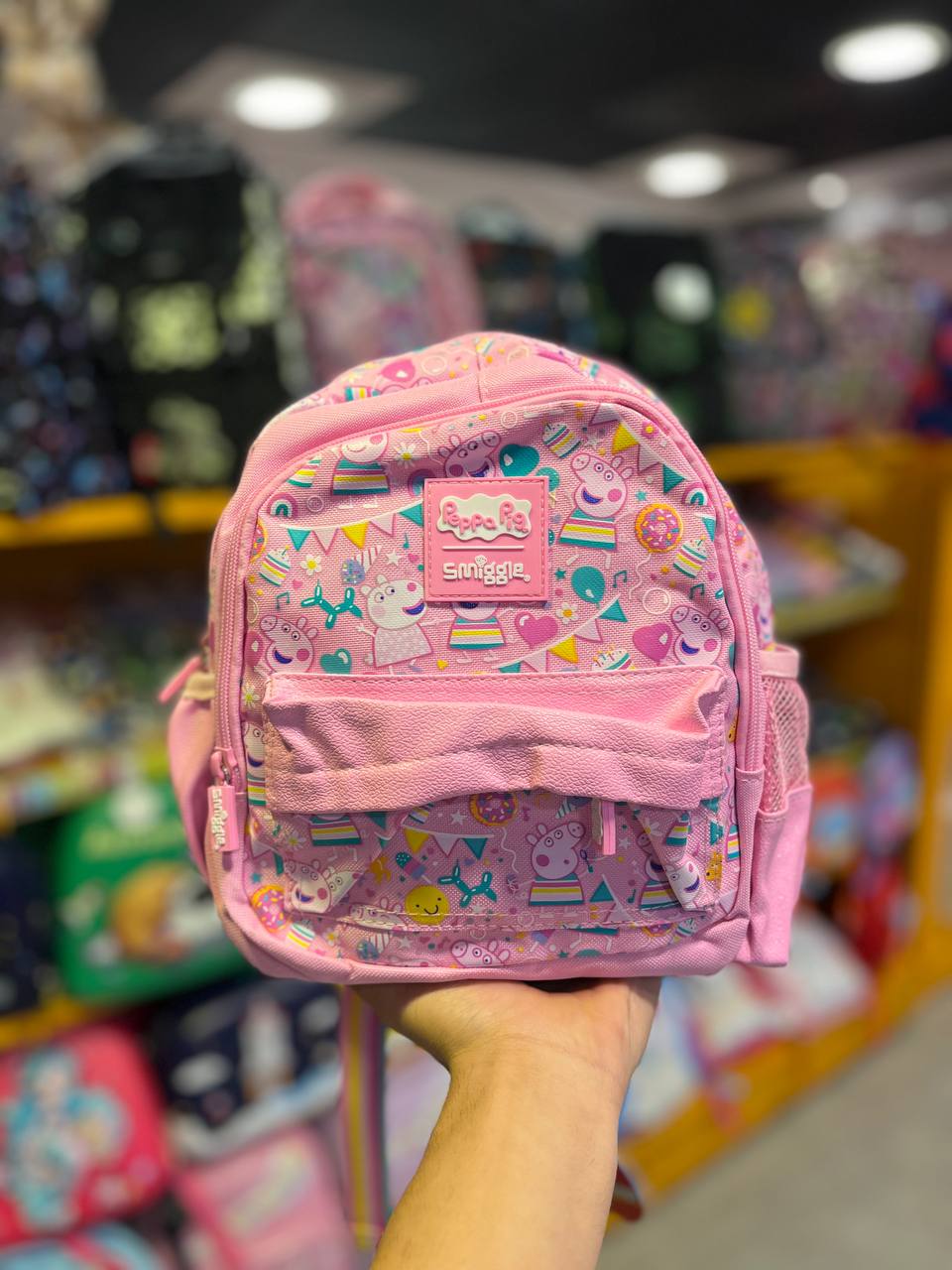 photo_2025-09-24_17-34-34 کوله پشتی اسمیگل طرح پپا پیگ