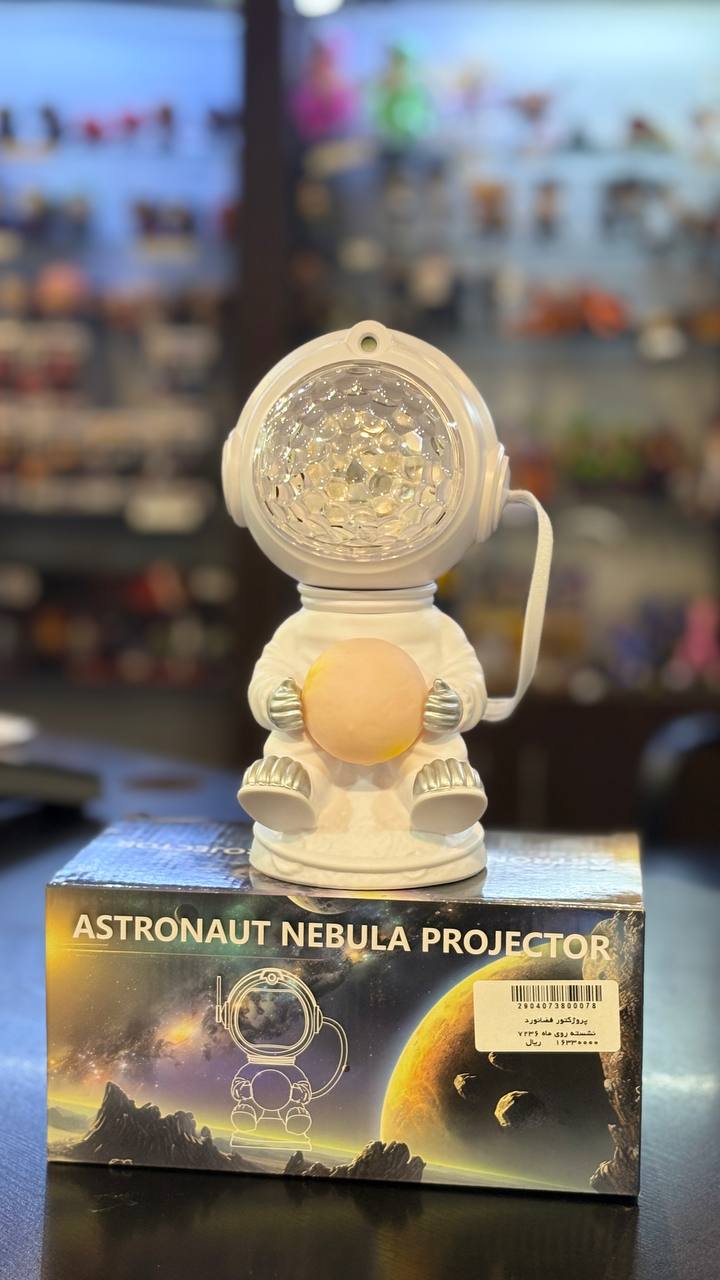 photo_2025-11-02_10-10-10 پروژکتور کهکشانی فضانورد نشسته روی ماه 7236 - تصویر 1
